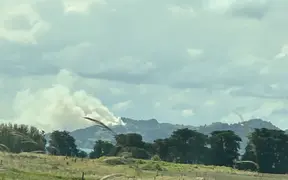Aerial boost in bid to contain vegetation fire at Whangārei Heads