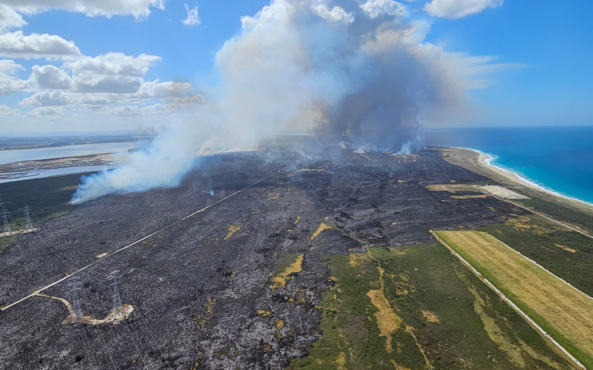 Tiwai firefighters concentrate on hotspots as investigators arrive