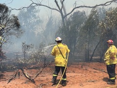 Fire fighters work to contain Narran Lake Rd fire 