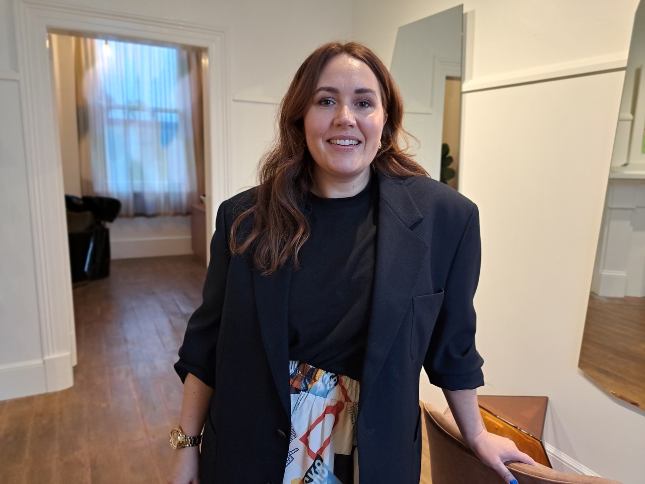 Hairdresser happy to be back and helping people feel good