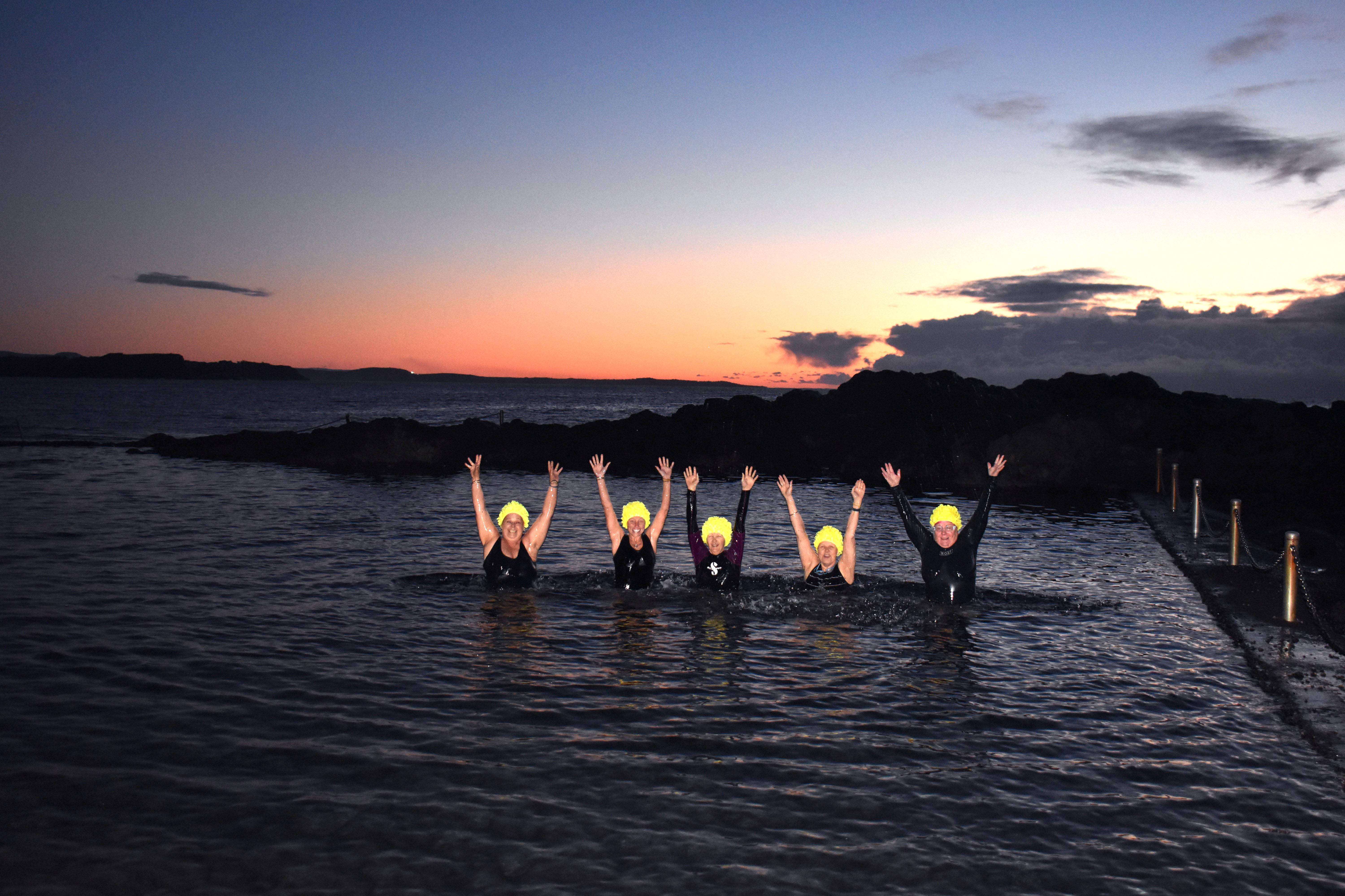 Rising early, diving in, and standing up to cancer