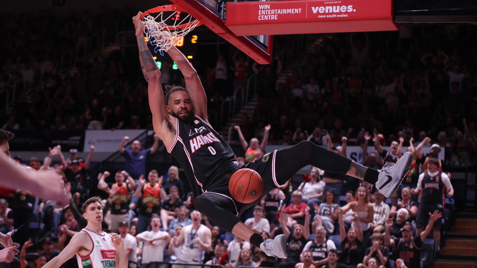 Hawks stumble in first step of title defence