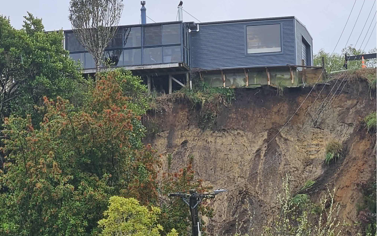 Manapouri slip closes road, threatens house and tourist operations