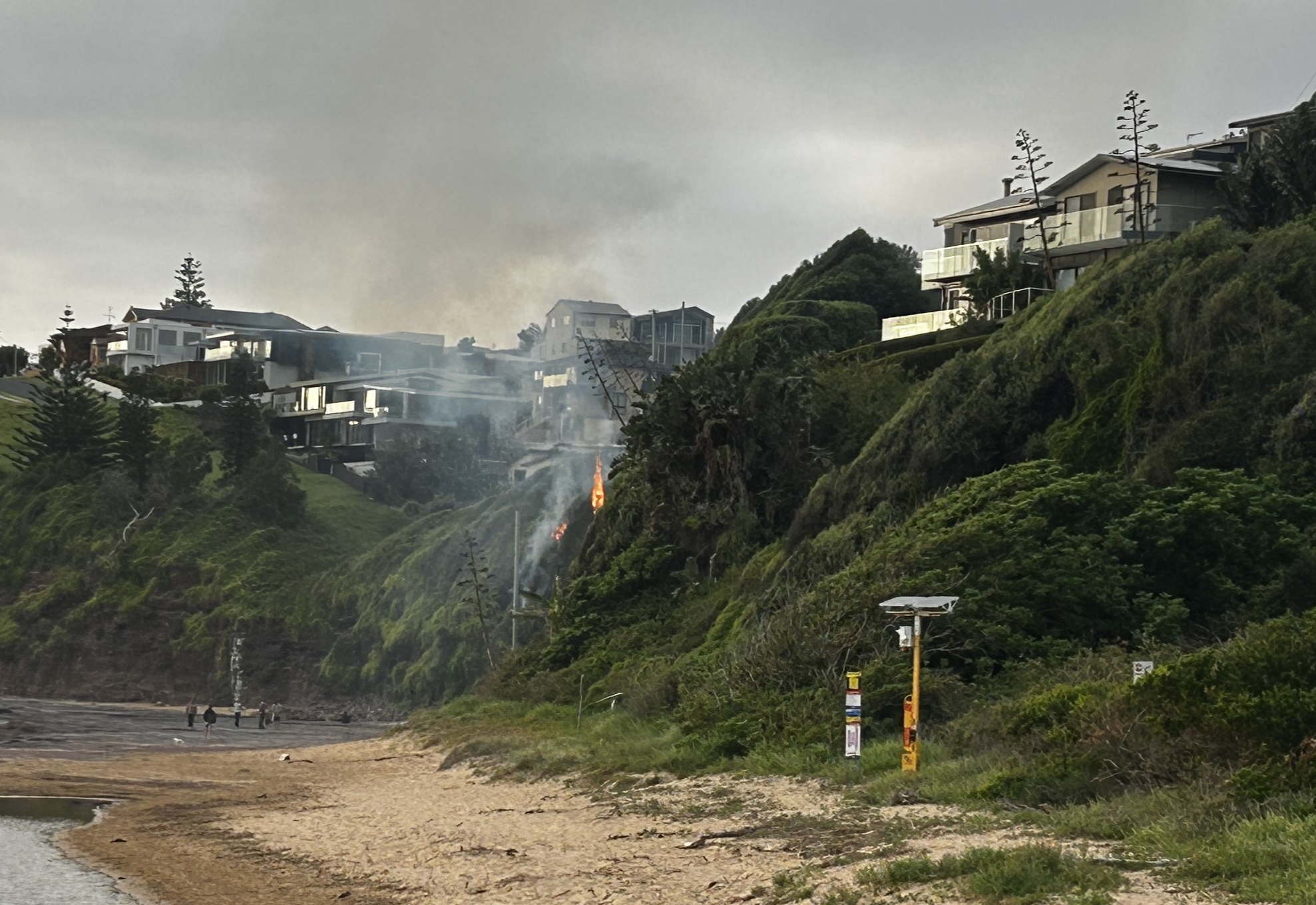 Fire crews rush to Bombo Beach to extinguish blaze