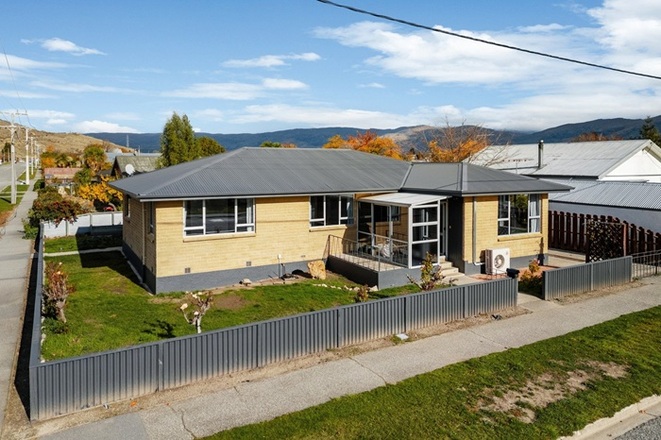 Solid Home on Prime Corner Site!